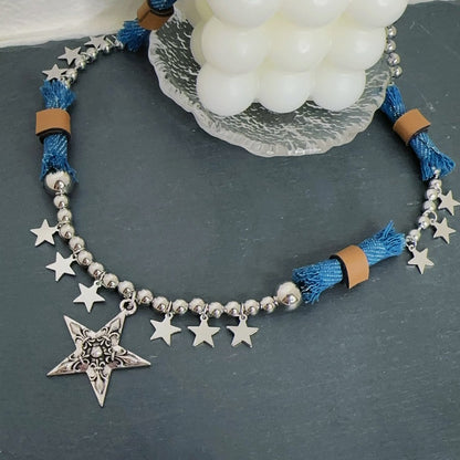 Original Denim and Star Charm Necklace with Silver-Toned Accents - Edgy Celestial Style for Casual Outings, Parties, and Statement Styling, Offering Unique and Eye-Catching Appeal for Women